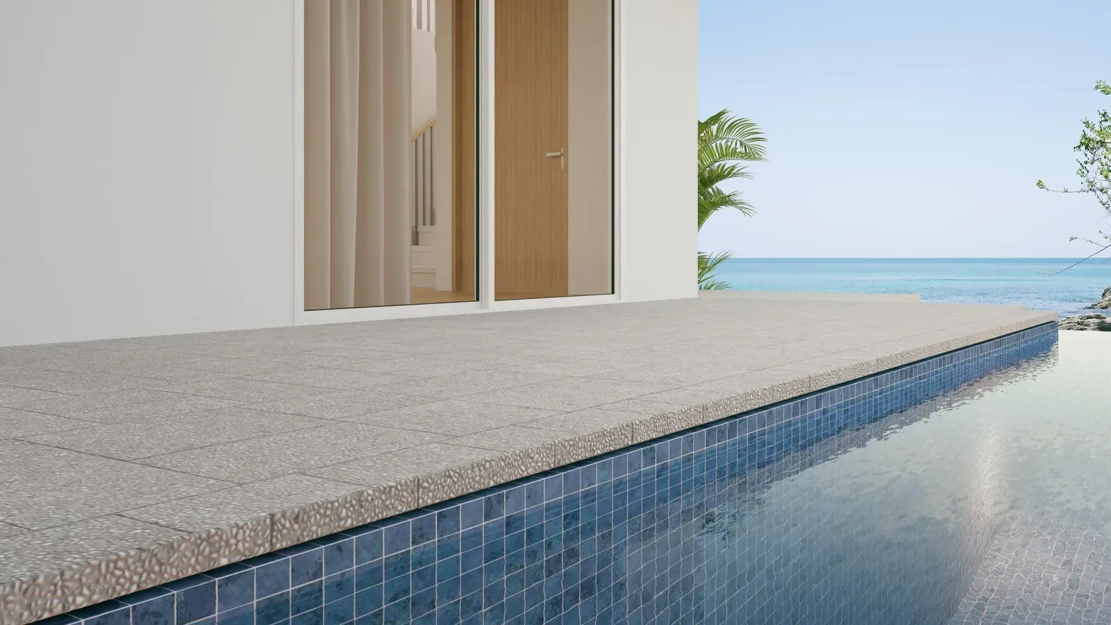 Pavimento in gres per esterni su una terrazza con bordo piscina
