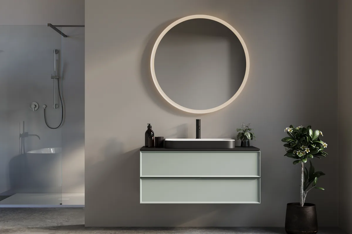 Idee per arredare un bagno piccolo con mobile sospeso e specchio tondo retroilluminato